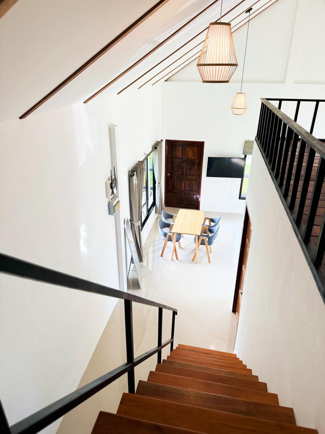 View down the stairs to the dining area